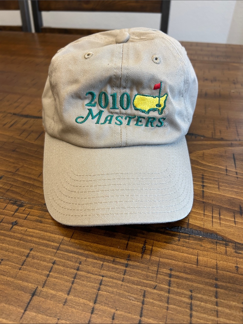 American Needle 2010 Masters Beige Cap with Green, Yellow & Red Embroidery